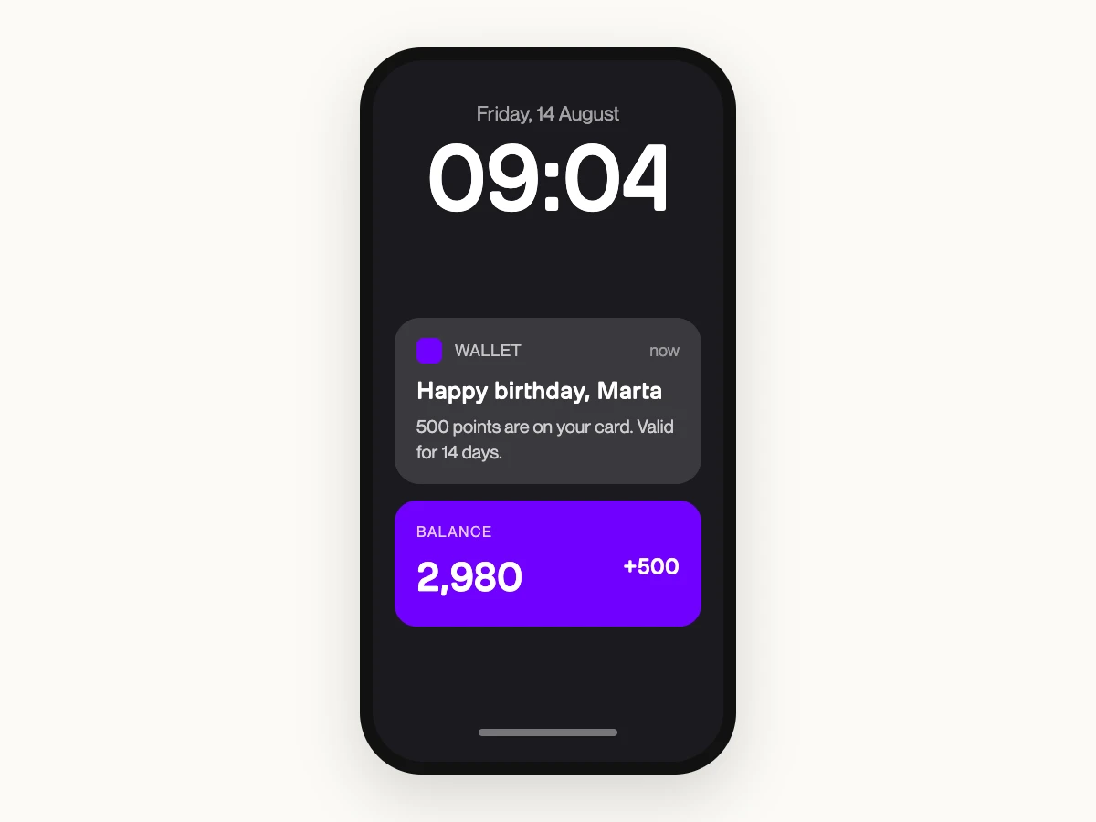 Wallet push on lock screen wishing happy birthday with reward already applied to the pass
