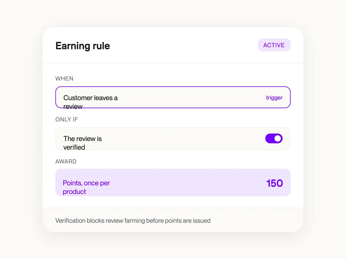 Earning rule setup screen with 'verified review' trigger and configurable point value